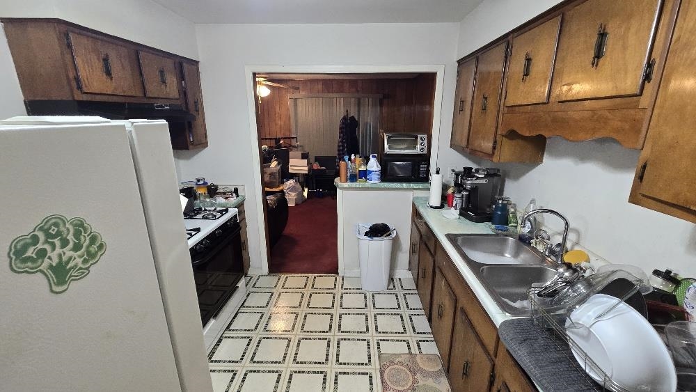 3162 Ford Road Memphis, TN 38109 - Photo 9 of 17 a room with storage and utility