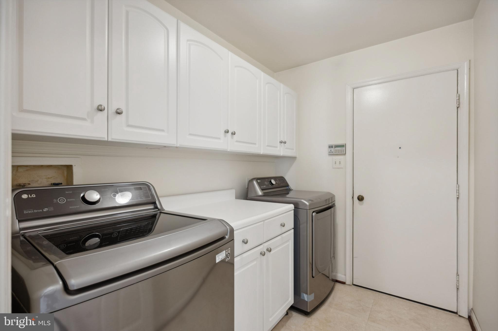 2331 Holly Spring Drive Silver Spring, MD 20905 - Photo 15 of 45 Washer/Dryer On Main Level