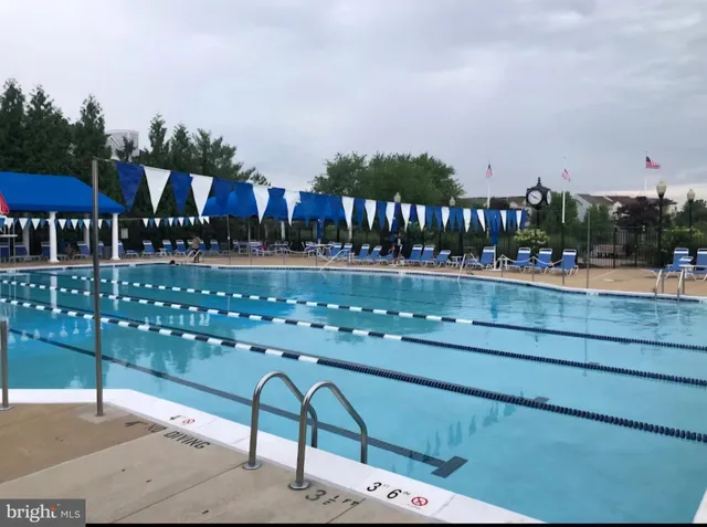 a city view with tall buildings and a yard in the back