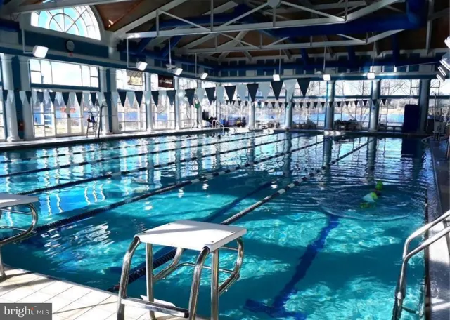 a view of a chairs and table in patio