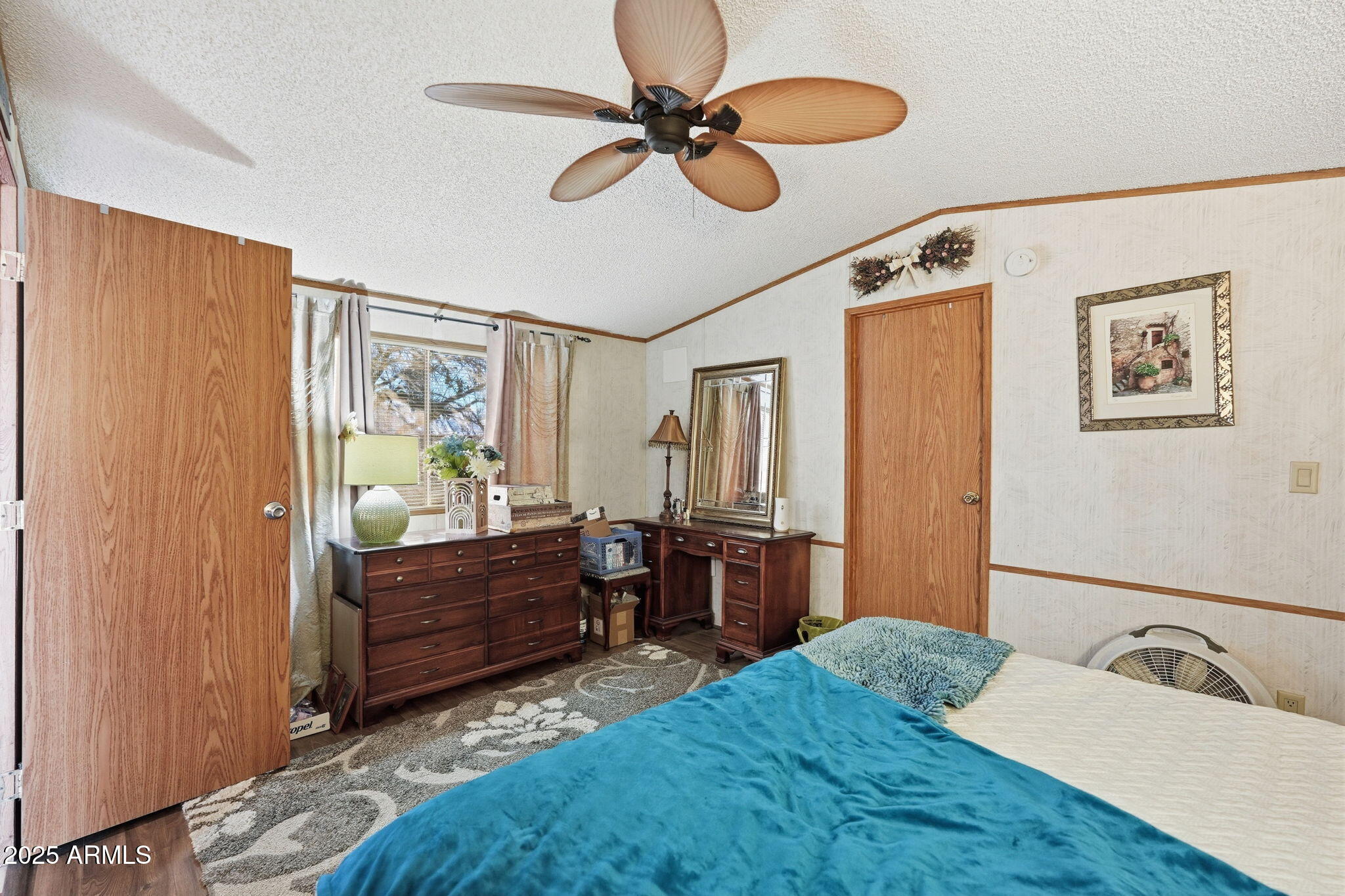 1925 South Arizona Boulevard, Unit 141 Coolidge, AZ 85128 - Photo 15 of 19 a bathroom with a tub sink and mirror