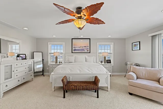 a bed room with bed and window