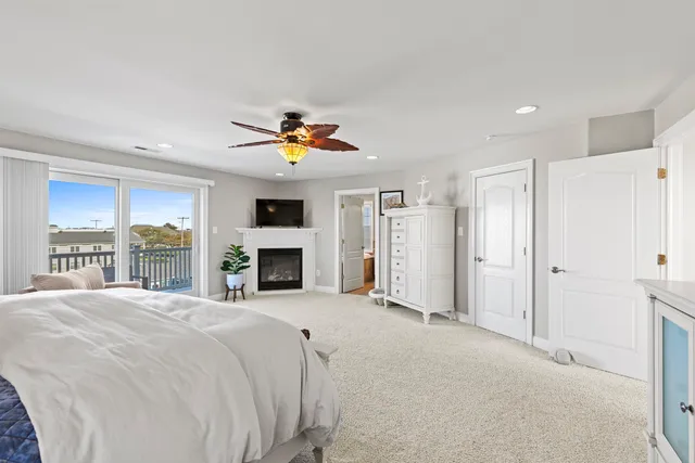 a bed room with a bed and a fireplace