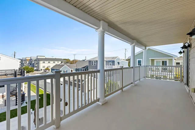 a view of a balcony with city view