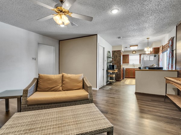 634 Bright Penny Lane Houston, TX 77015 - Photo 13 of 24 a living room with furniture and kitchen view