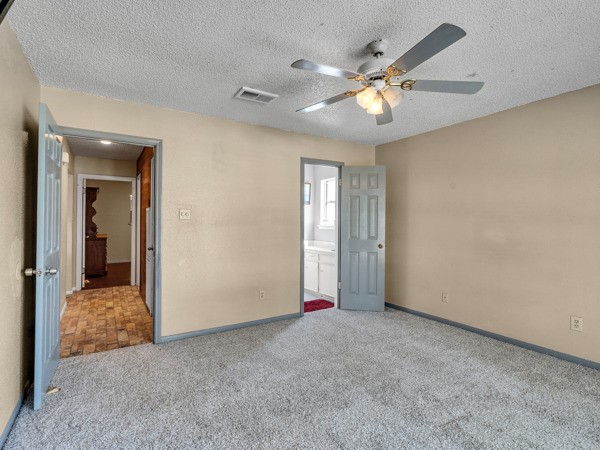 634 Bright Penny Lane Houston, TX 77015 - Photo 18 of 24 an empty room with fan and entrance