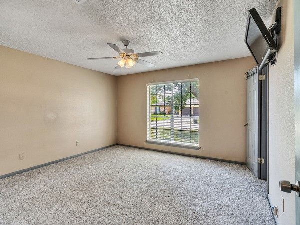 634 Bright Penny Lane Houston, TX 77015 - Photo 19 of 24 a view of an empty room with a window
