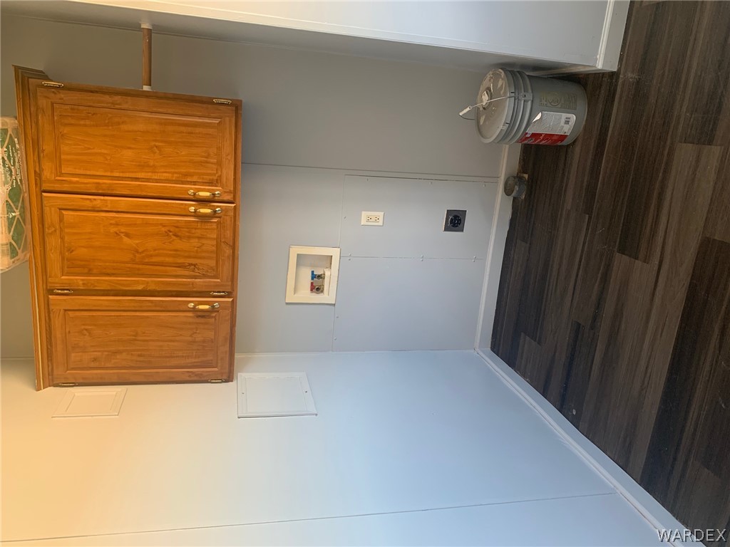 4745 Smoketree Road Golden Valley, AZ 86413 - Photo 13 of 33 a view of a storage and utility room with wooden floor