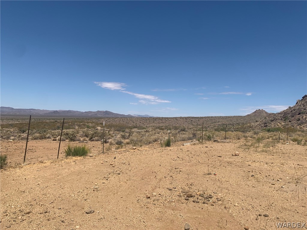 4745 Smoketree Road Golden Valley, AZ 86413 - Photo 31 of 33 a view of yard with ocean view