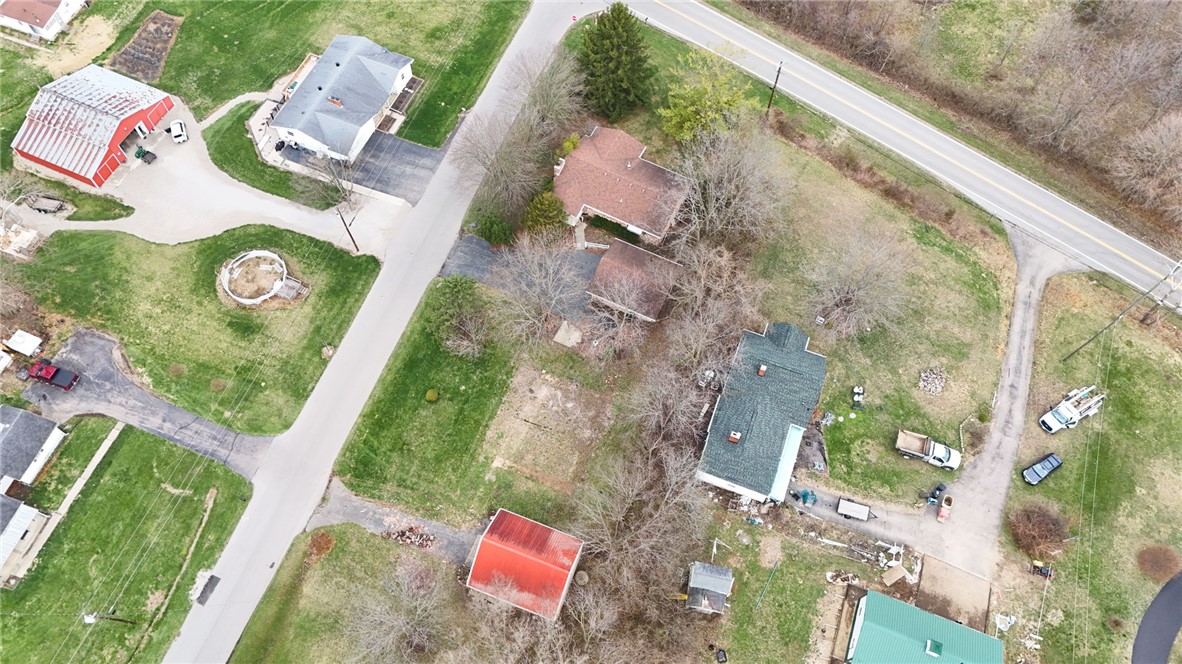 6711 Hamilton-Middletown Road Franklin, OH 45005 - Photo 44 of 49 An aerial view showcases a vibrant community with charming homes nestled amidst lush greenery.