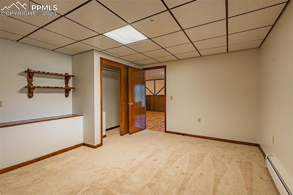 98 Button Rock Road Lyons, CO 80540 - Photo 19 of 49 a view of a room with wooden walls