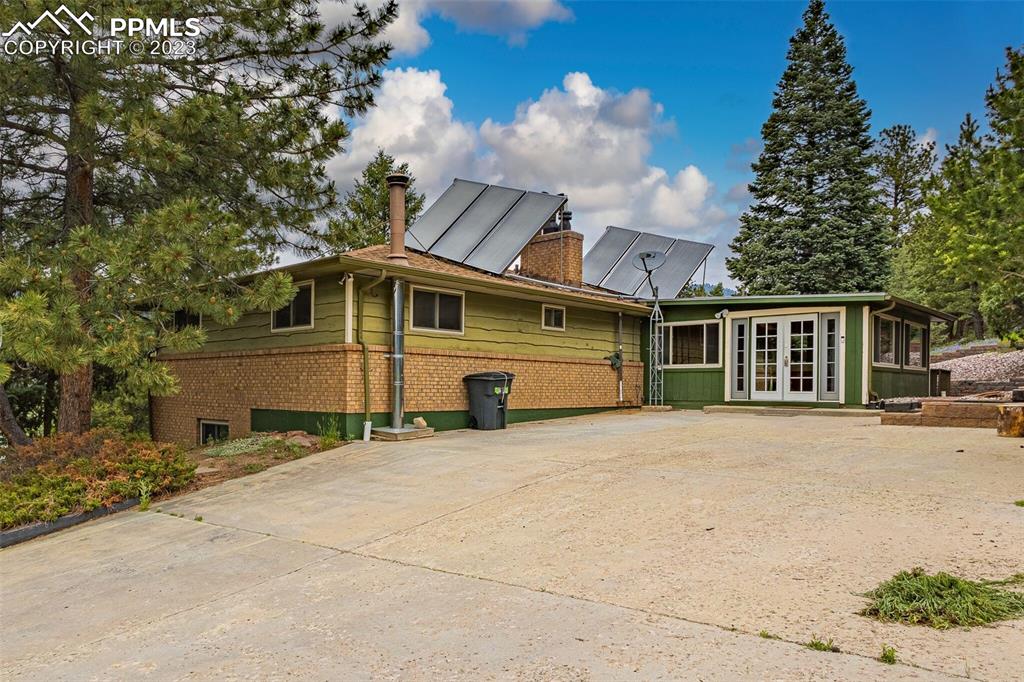 98 Button Rock Road Lyons, CO 80540 - Photo 34 of 49 front view of a house with a outdoor space