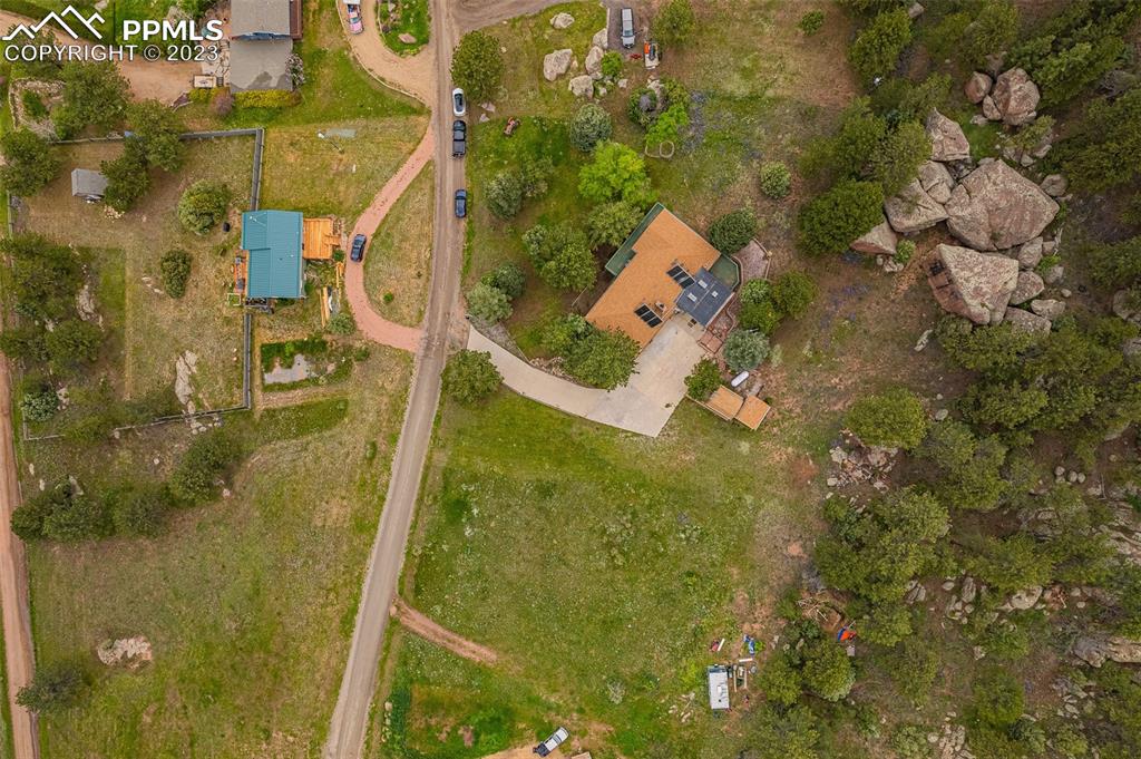 98 Button Rock Road Lyons, CO 80540 - Photo 44 of 49 an aerial view of residential house with pool and yard