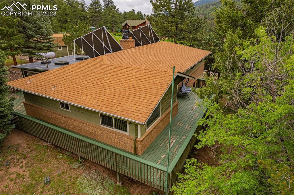 98 Button Rock Road Lyons, CO 80540 - Photo 45 of 49 a balcony with table and chairs