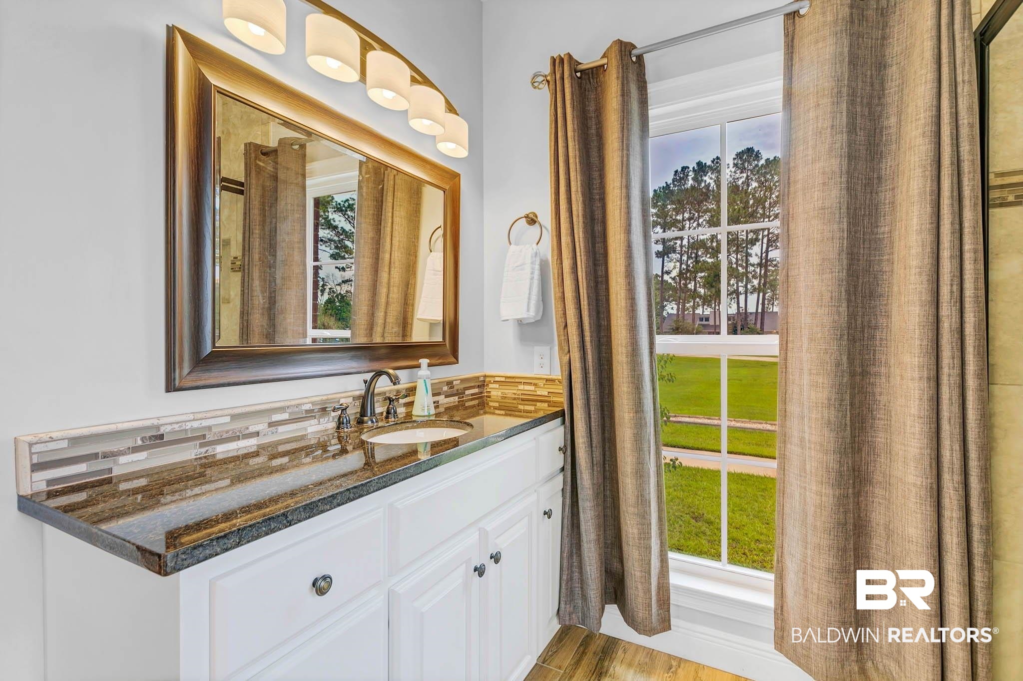 8145 Bay View Drive Foley, AL 36535 - Photo 34 of 81 The Primary Bathroom features a garden tub, separate shower, split double vanity and private water closet.