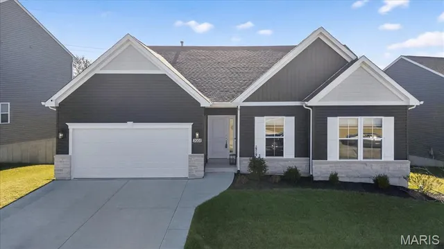 $489,900 | 2002 Wyndgate Meadows Drive, Lake St. Louis, MO 63367