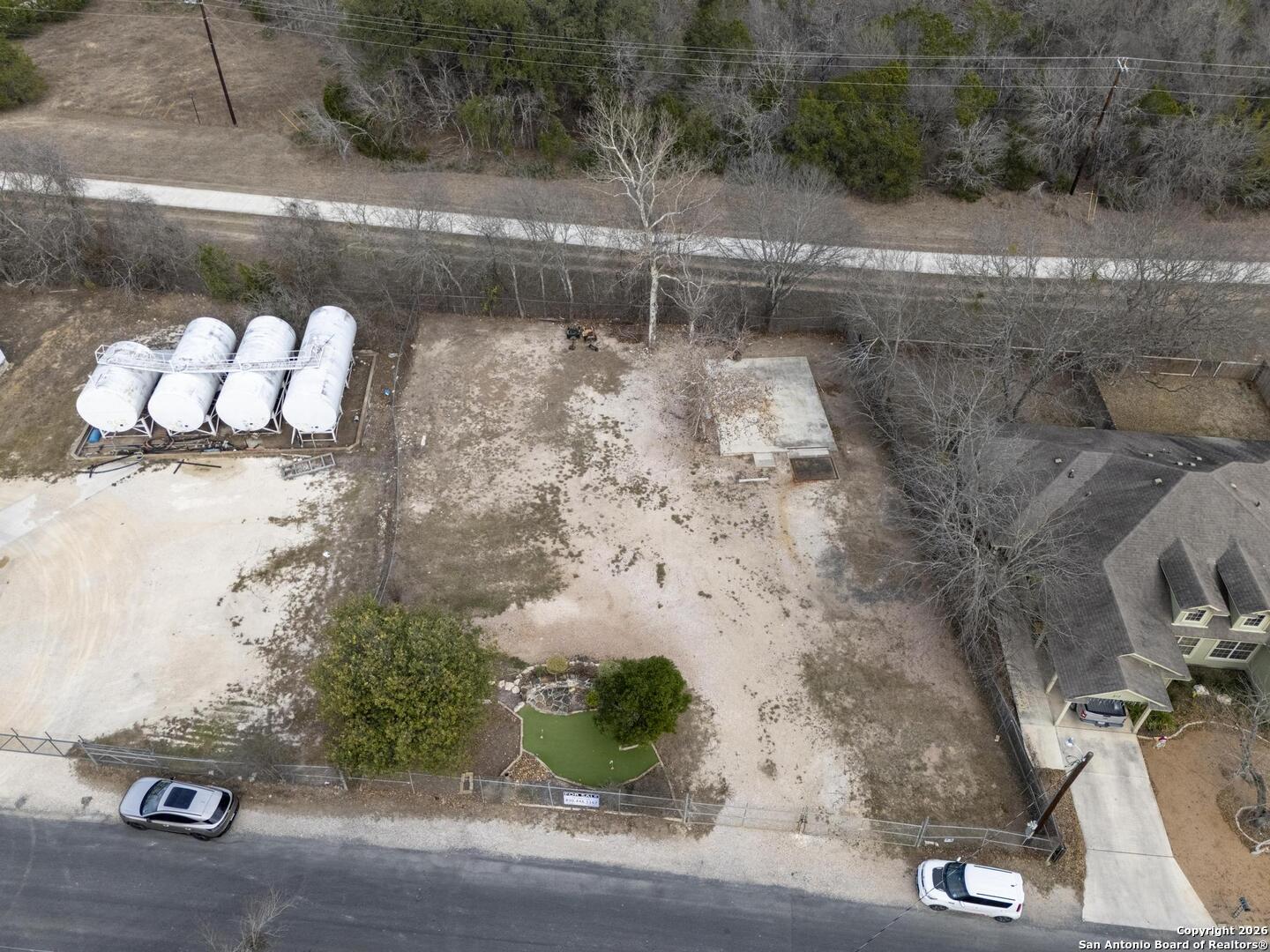 311 Ebner Street Boerne, TX 78006 - Photo 2 of 11 an aerial view of a houses with yard