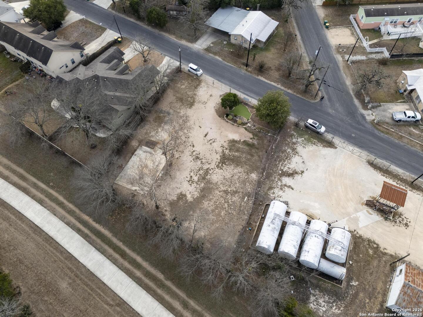 311 Ebner Street Boerne, TX 78006 - Photo 8 of 11 a view of a backyard of a house