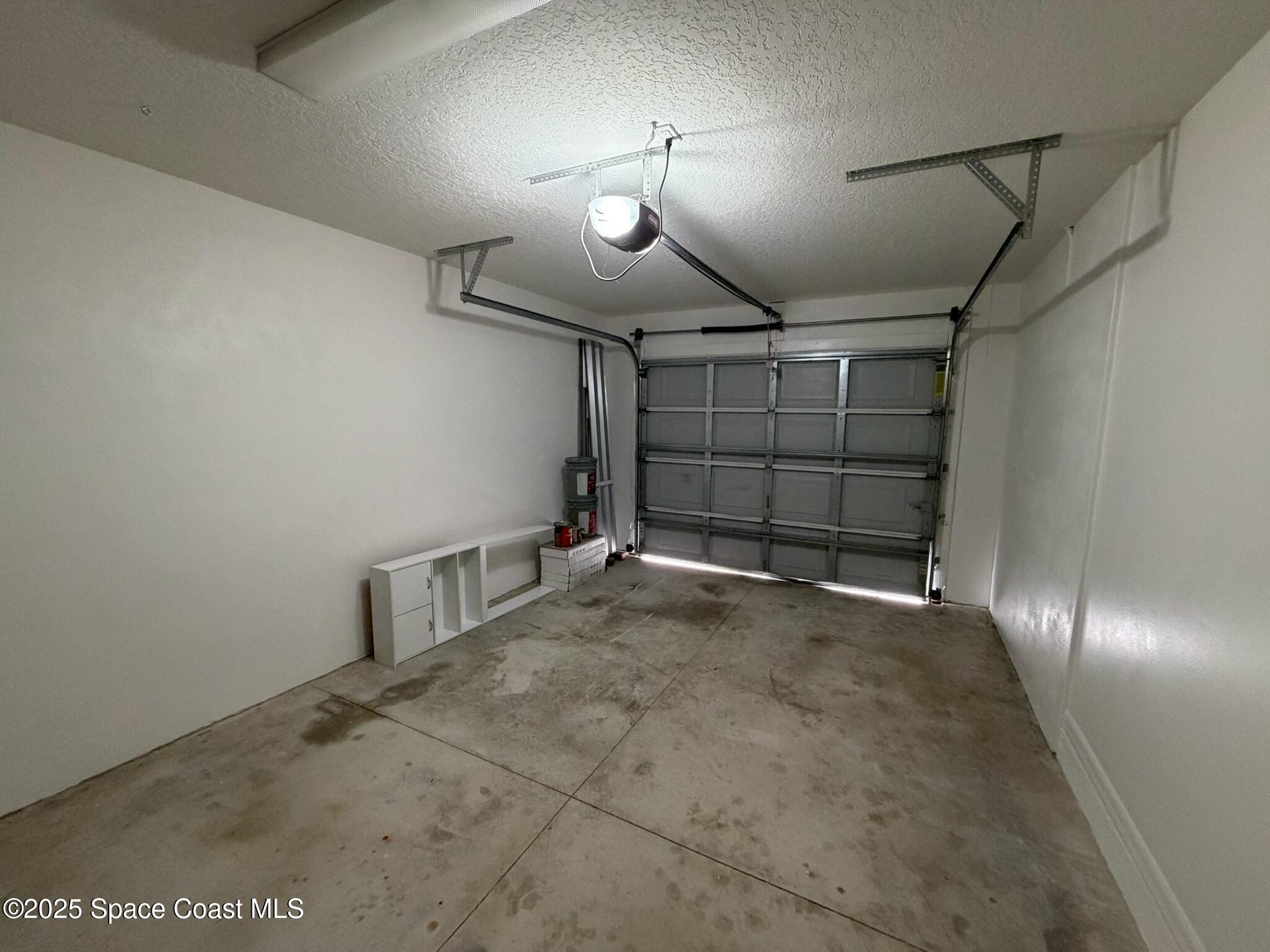 1626 Mason Terrace Melbourne, FL 32935 - Photo 20 of 24 a view of a garage