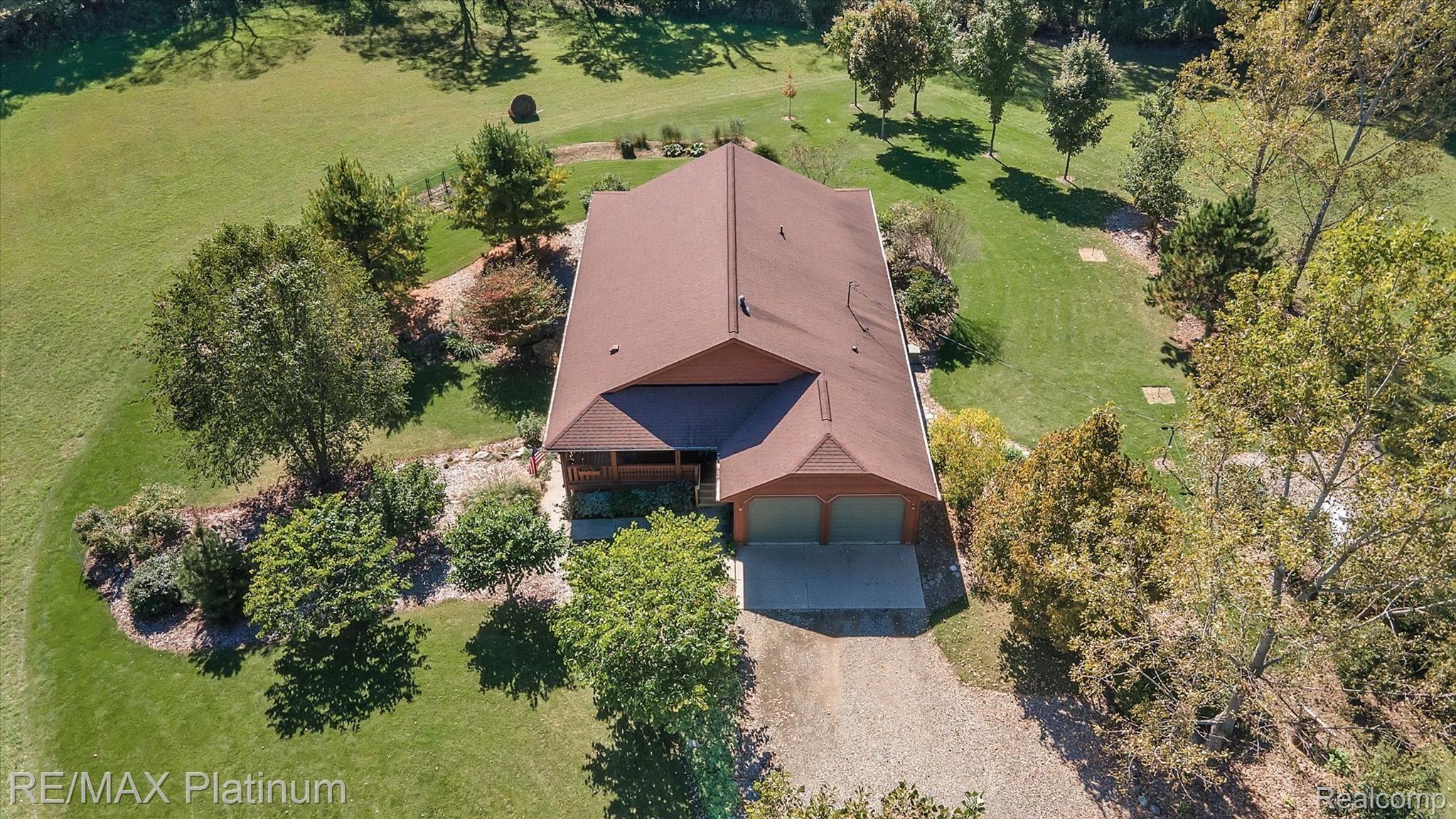11061 Wiggins Road Howell, MI 48855 - Photo 56 of 79 ENJOY PLAYING HORSESHOES~