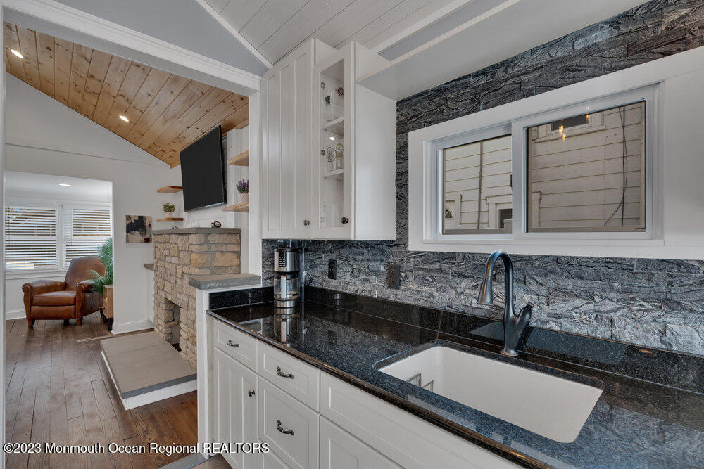 28 Pinehurst Road Brick, NJ 08723 - Photo 17 of 40 a kitchen with a sink and cabinets