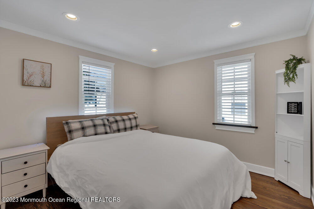 28 Pinehurst Road Brick, NJ 08723 - Photo 23 of 40 a bed sitting in a bedroom next to a window