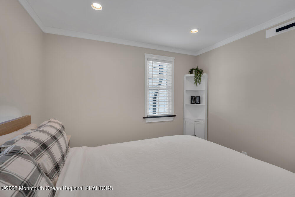 28 Pinehurst Road Brick, NJ 08723 - Photo 24 of 40 a bedroom with a bed and a window