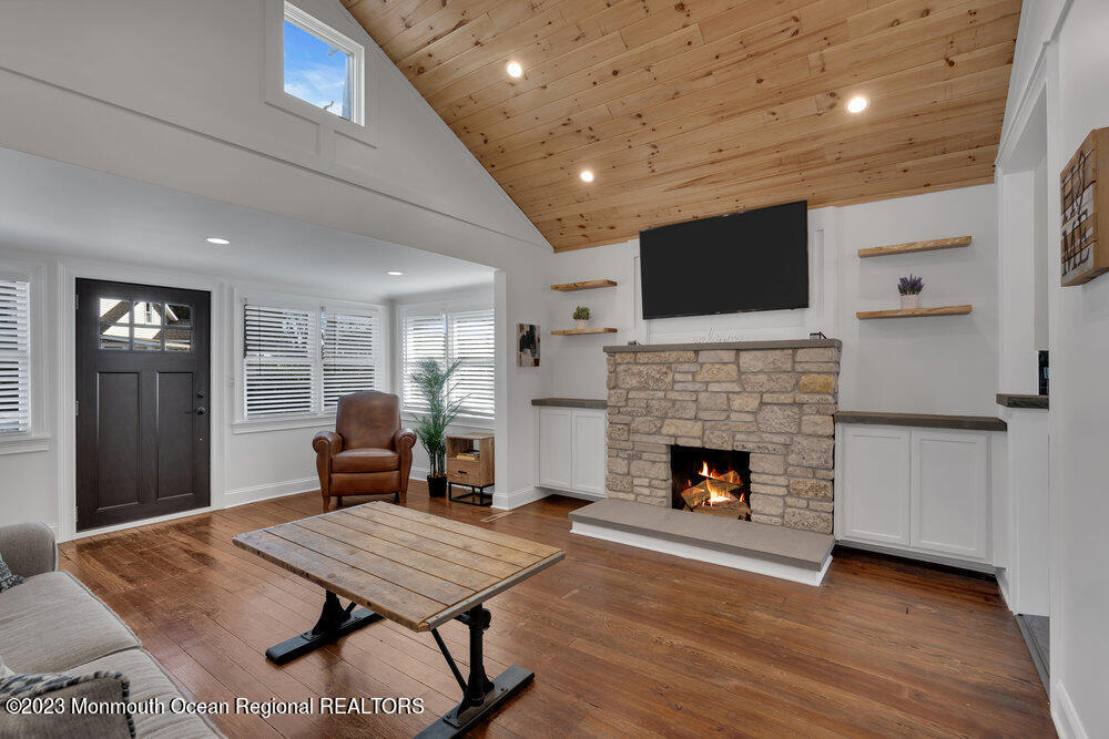 28 Pinehurst Road Brick, NJ 08723 - Photo 3 of 40 a living room with furniture or fireplace and a wooden floor