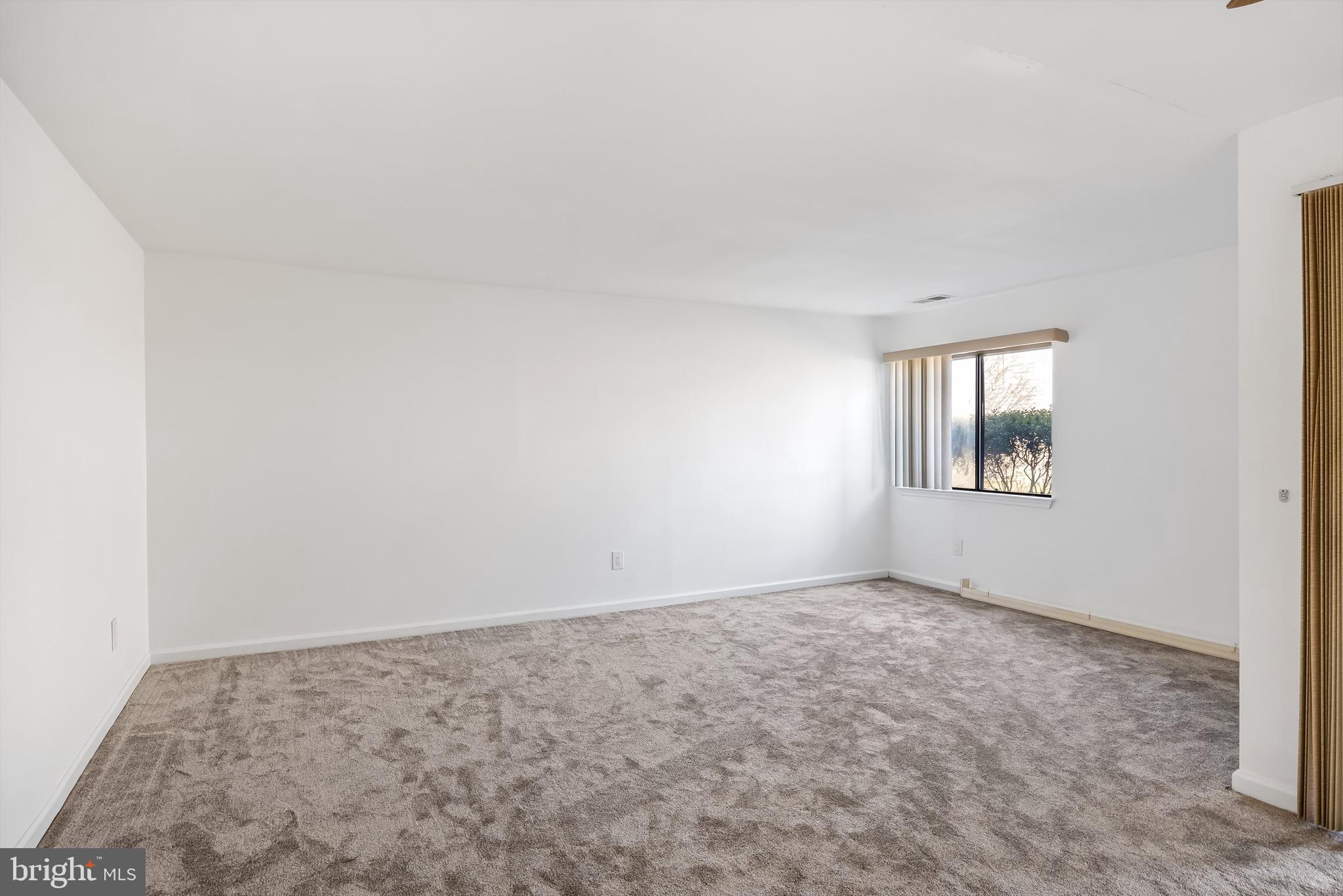 1801 Egg Harbor Road, Unit 105 Clementon, NJ 08021 - Photo 11 of 23 Living room with new carpet