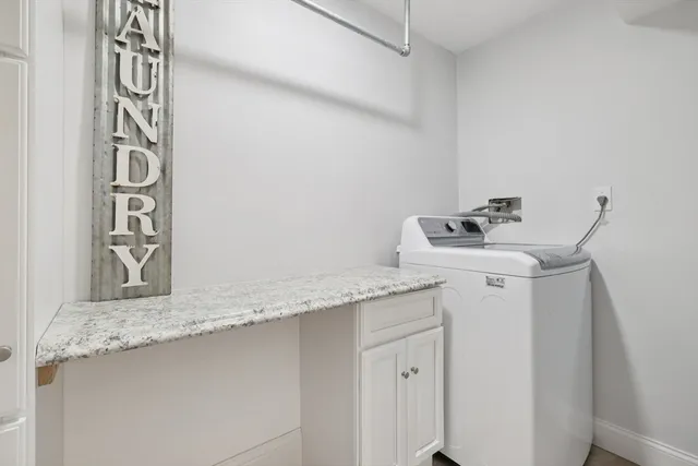 a utility room with a sink