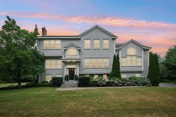 a view of a house with a big yard