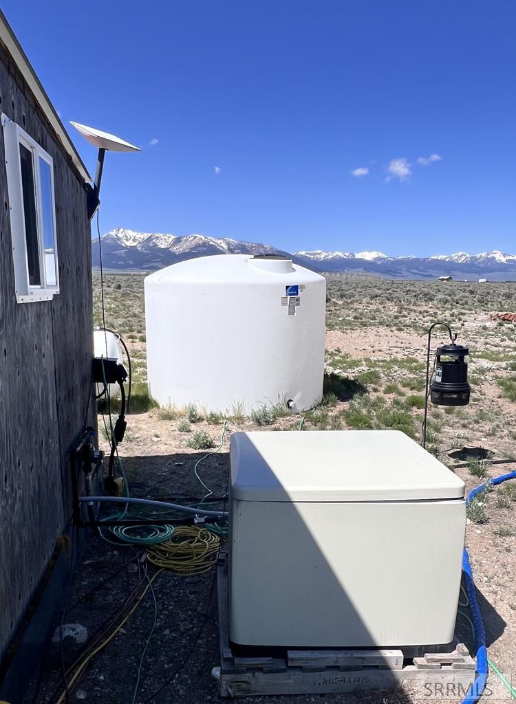 22 Sutton Lane Leadore, ID 83464 - Photo 28 of 40 1,500-gallon water tank - Cummins propane generat