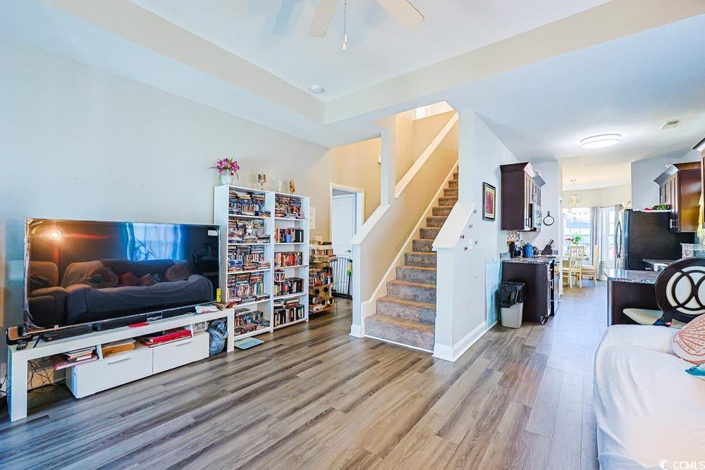 724 Hobonny Loop Longs, SC 29568 - Photo 2 of 40 Living room featuring stairway, light wood-type flooring, and ceiling fan
