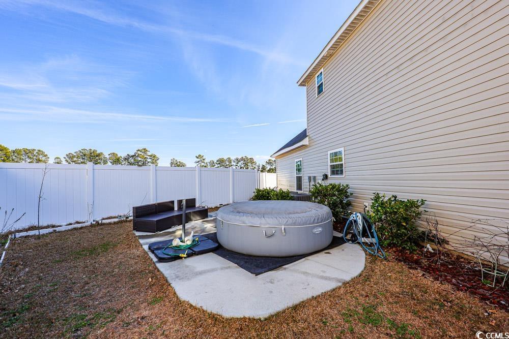 724 Hobonny Loop Longs, SC 29568 - Photo 35 of 40 Fenced backyard featuring a patio area