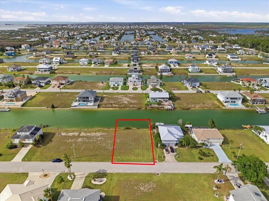 3487 Croaker Drive Hernando Beach, FL 34607 - Photo 11 of 27 an aerial view of a house with a ocean view