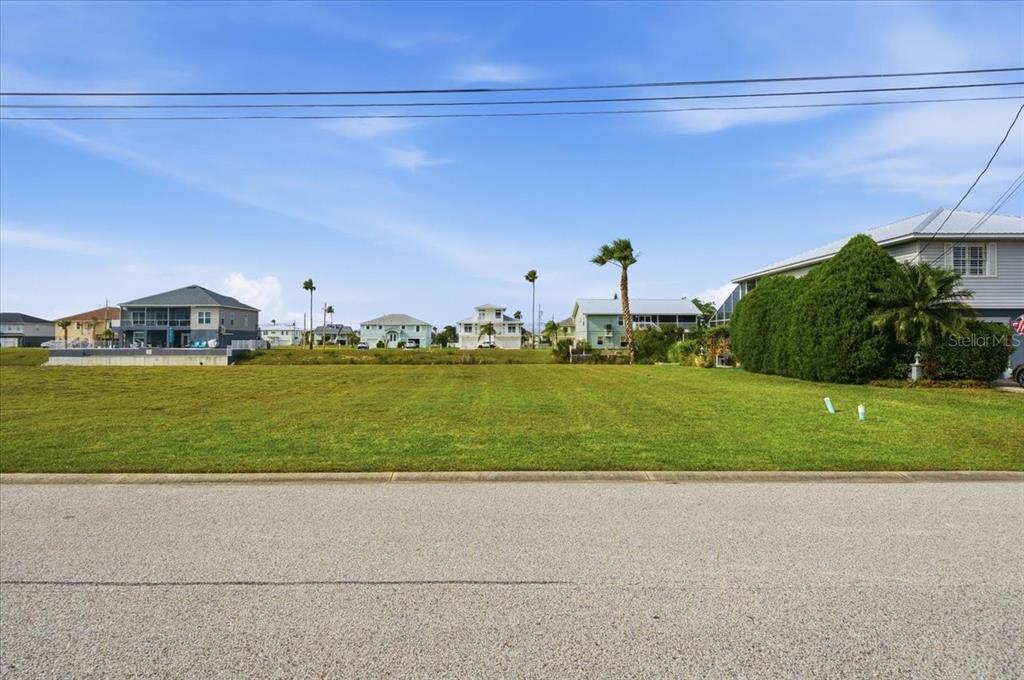 3487 Croaker Drive Hernando Beach, FL 34607 - Photo 6 of 27 a view of a green field