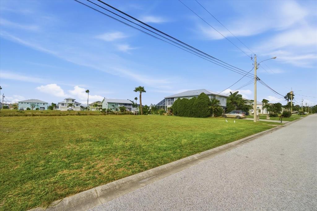 3487 Croaker Drive Hernando Beach, FL 34607 - Photo 9 of 27 a view of a lake with a big yard