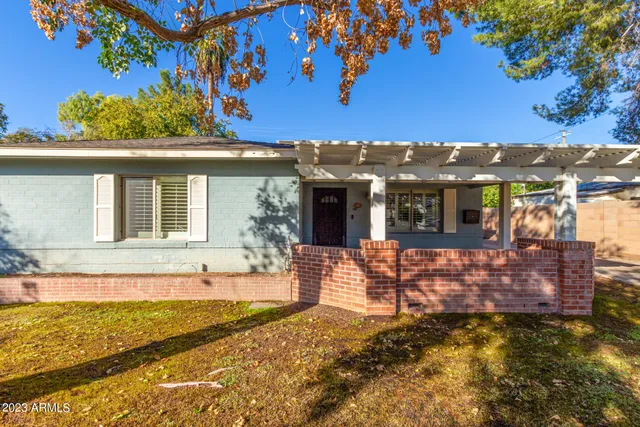 a view of a house with a swimming pool