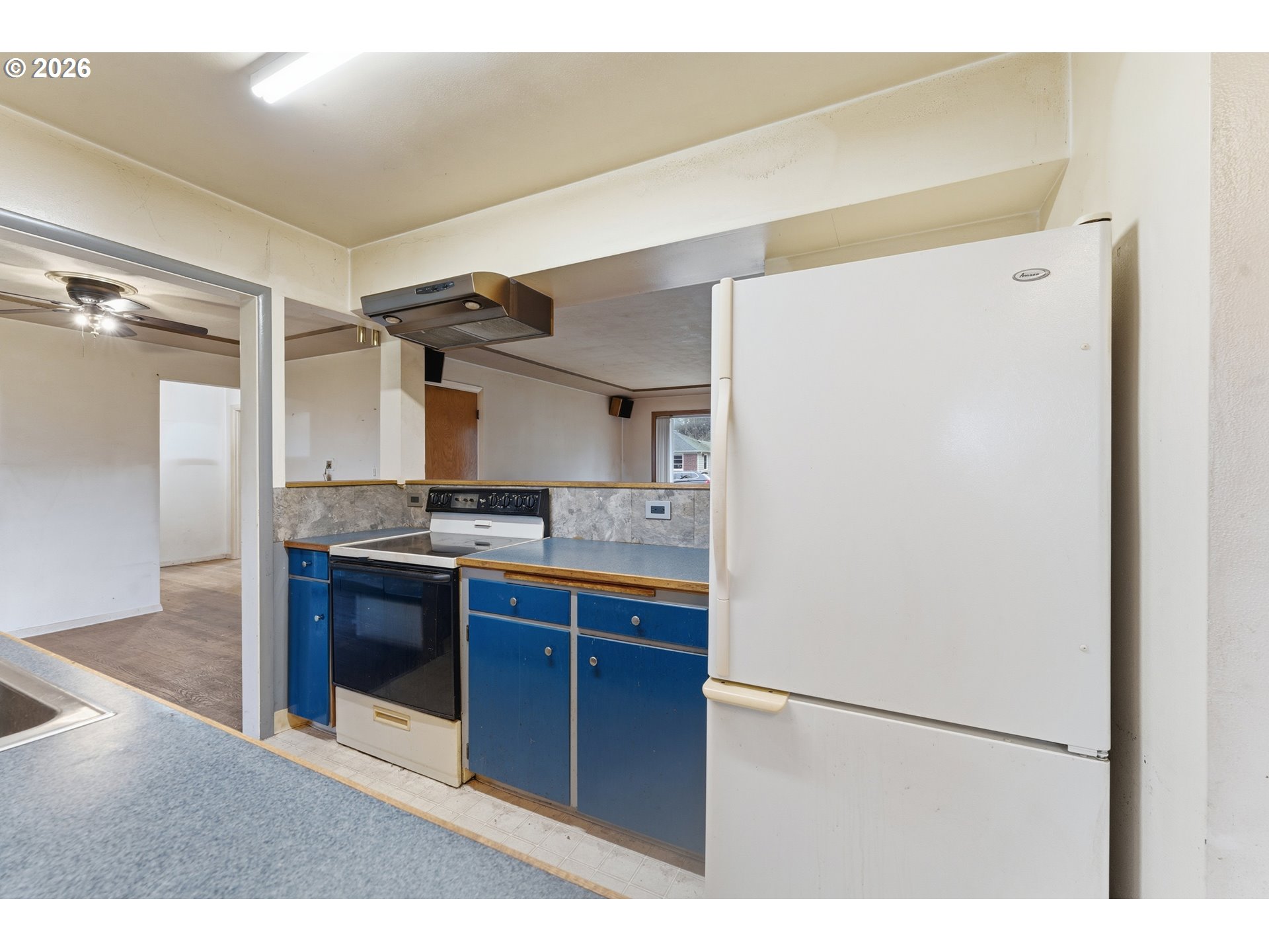 64 Northwest Florence Avenue Gresham, OR 97030 - Photo 15 of 29 a kitchen with stainless steel appliances granite countertop a refrigerator and a sink