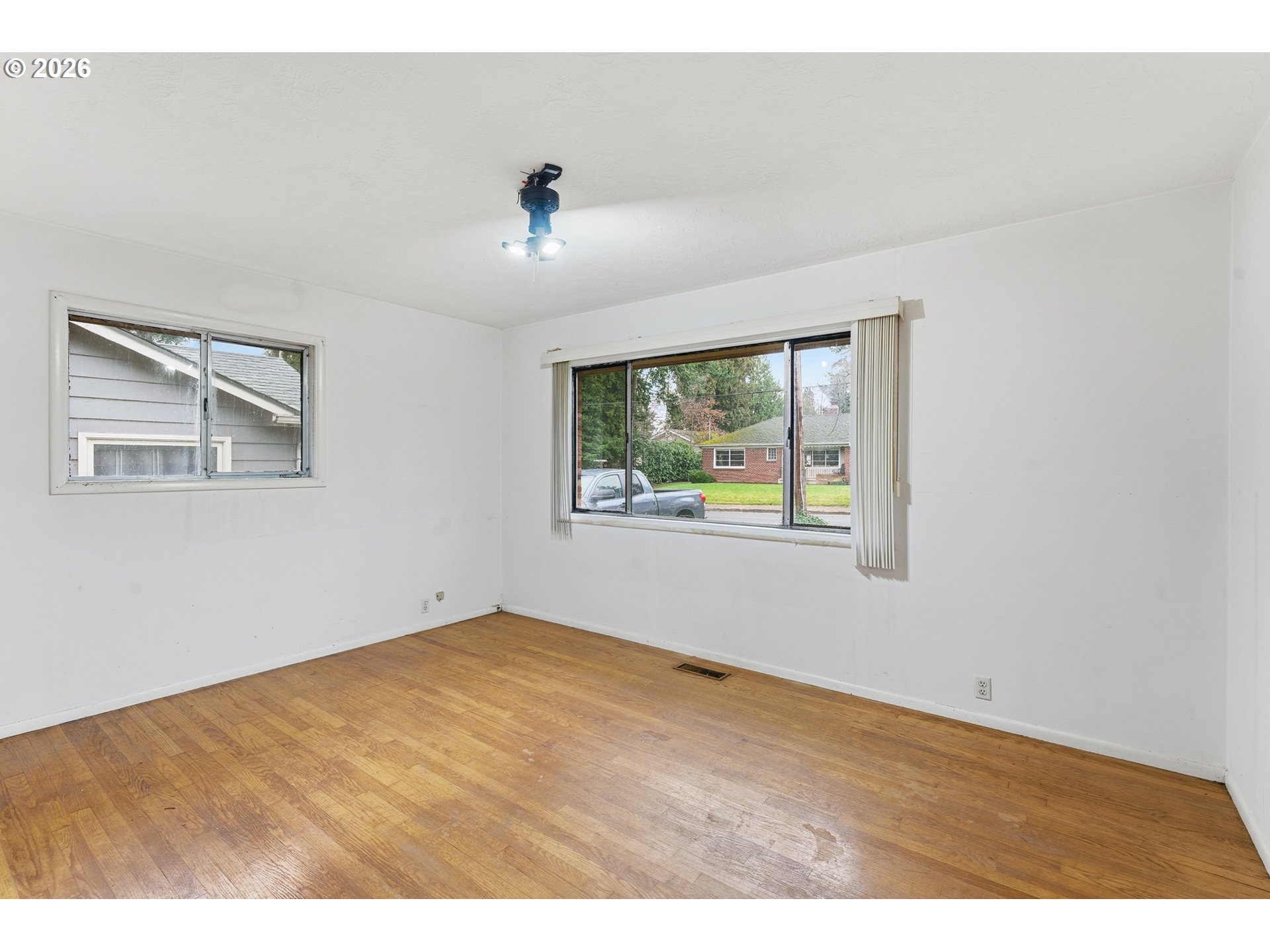 64 Northwest Florence Avenue Gresham, OR 97030 - Photo 18 of 29 a view of an empty room with a window