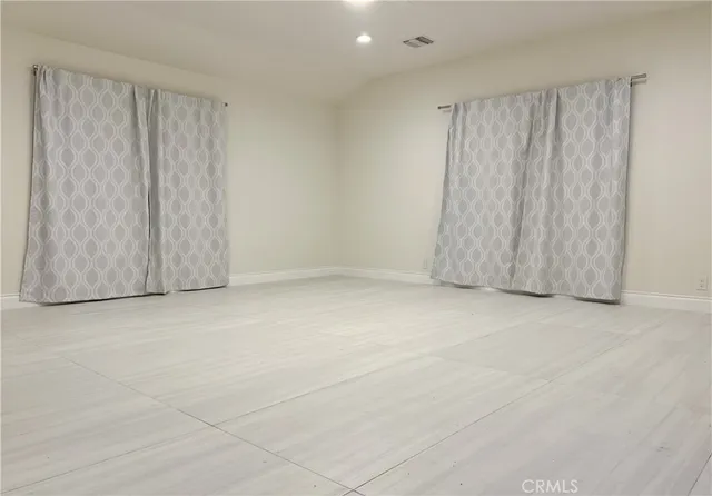 a kitchen with stainless steel appliances granite countertop a sink dishwasher stove and cabinets