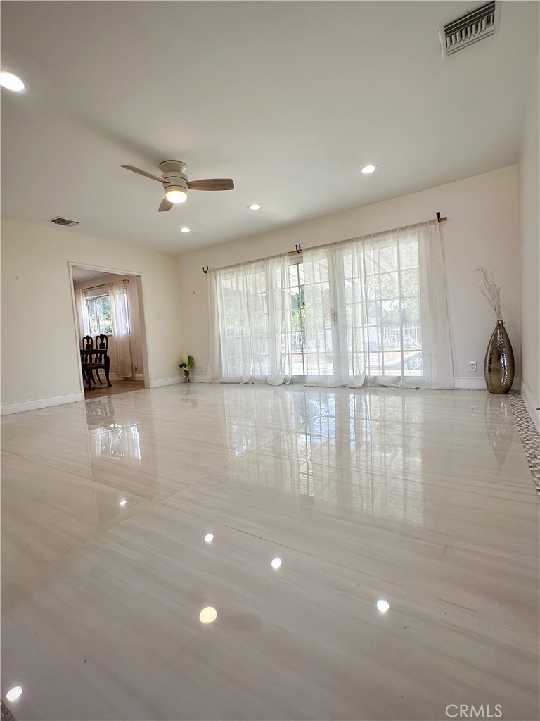 13218 McKinley Avenue Chino, CA 91710 - Photo 4 of 14 a view of an empty room with a window