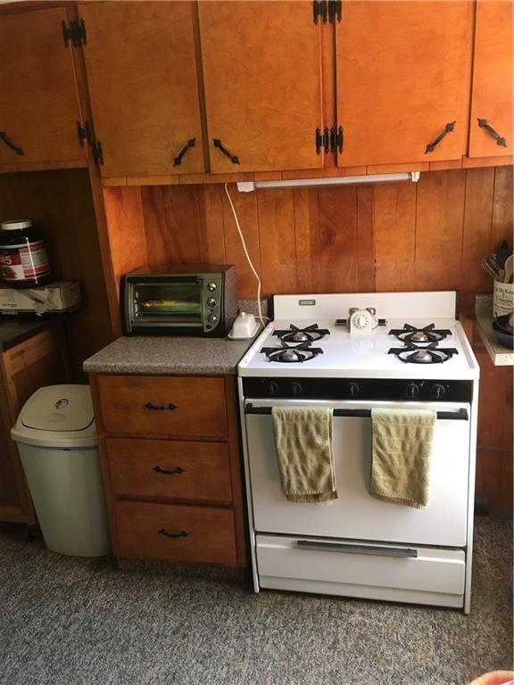 411 Ellis River Road Rumford, ME 04276 - Photo 13 of 26 Kitchen with gas range.