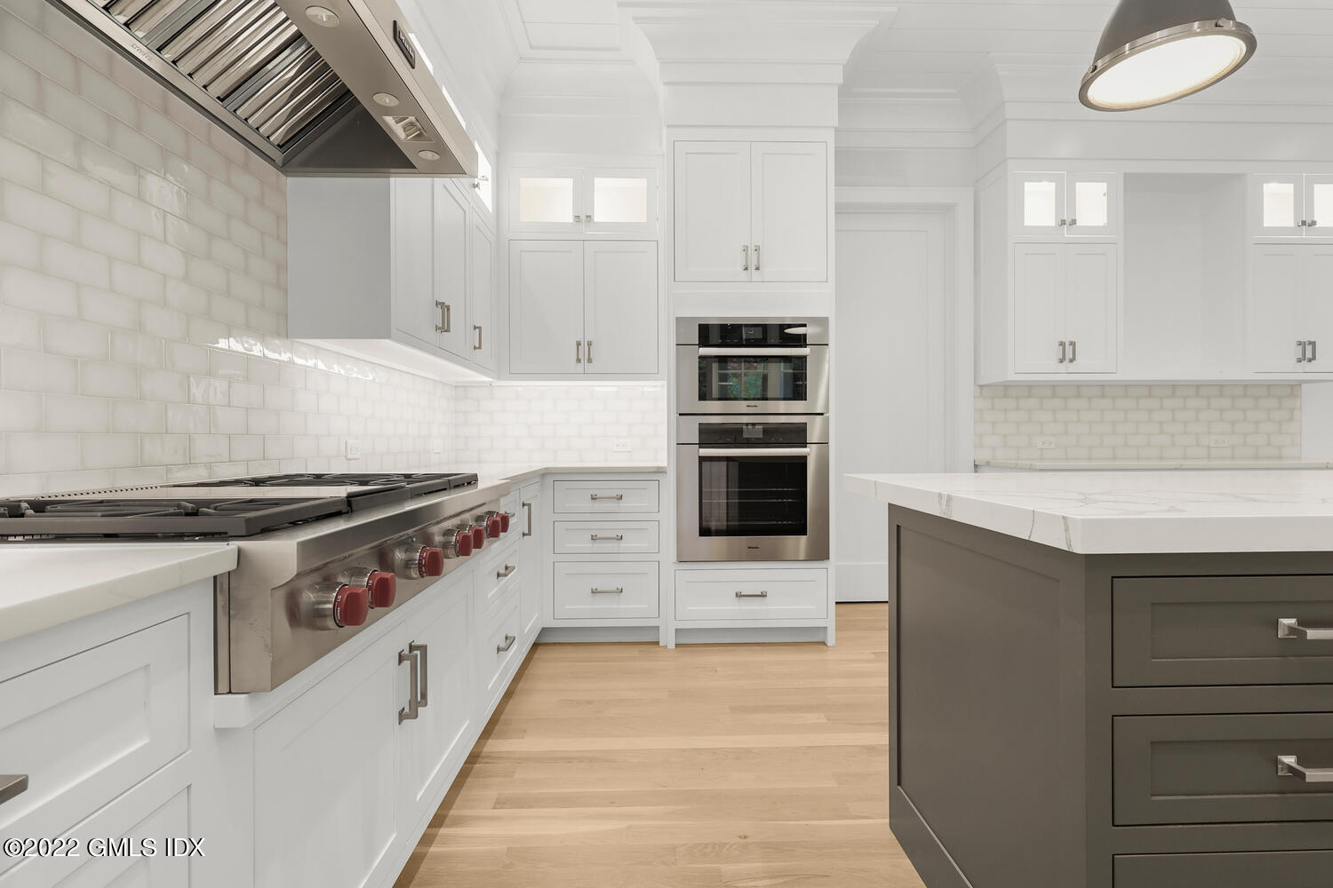 108 Sheephill Road Riverside, CT 06878 - Photo 11 of 47 a kitchen with stainless steel appliances a stove and a sink