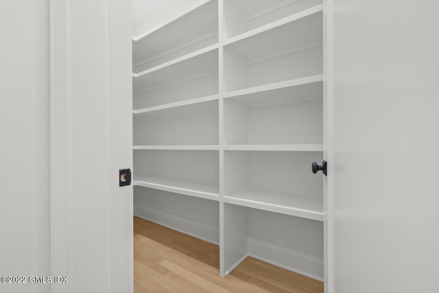 108 Sheephill Road Riverside, CT 06878 - Photo 13 of 47 a view of walk in closet with empty racks