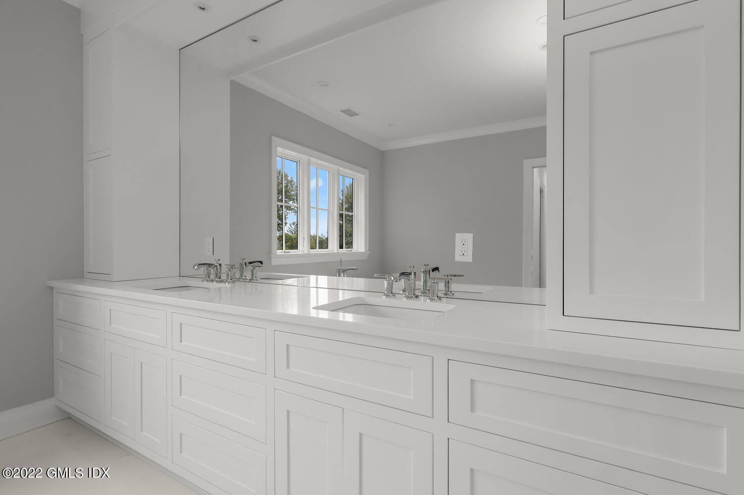 108 Sheephill Road Riverside, CT 06878 - Photo 25 of 47 a bathroom with double sink and a mirror