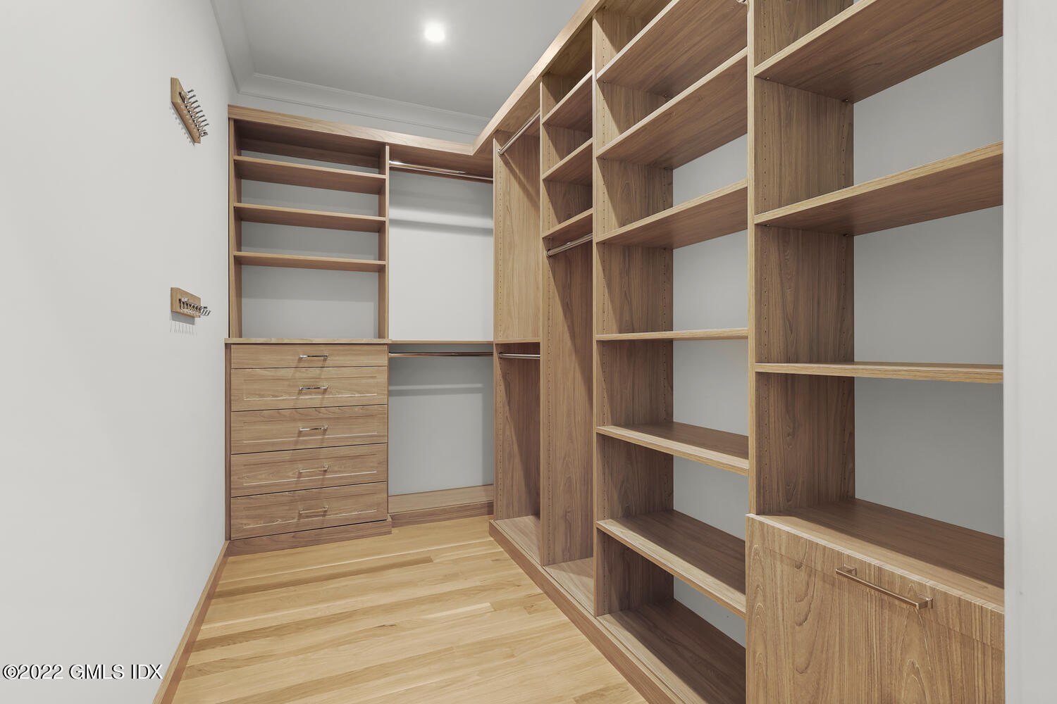 108 Sheephill Road Riverside, CT 06878 - Photo 28 of 47 a view of walk in closet with empty racks