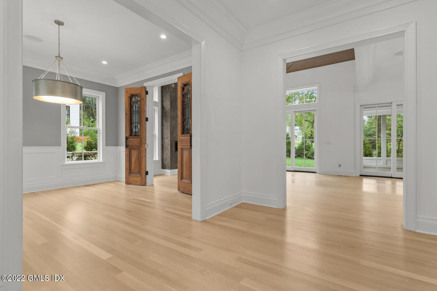 108 Sheephill Road Riverside, CT 06878 - Photo 3 of 47 a view of an empty room with window and wooden floor