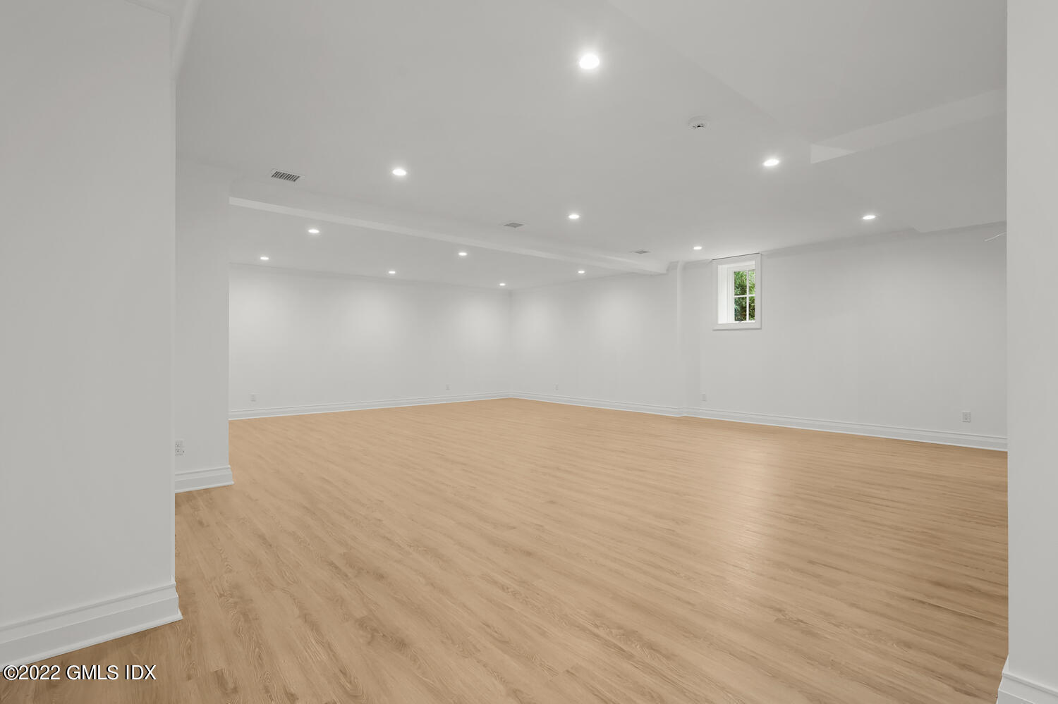 108 Sheephill Road Riverside, CT 06878 - Photo 39 of 47 a view of an empty room with wooden floor