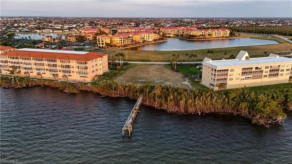 a view of a lake with a city
